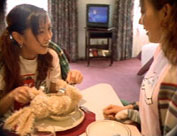Yumi attempts to eat Ami's stuffed rabbit